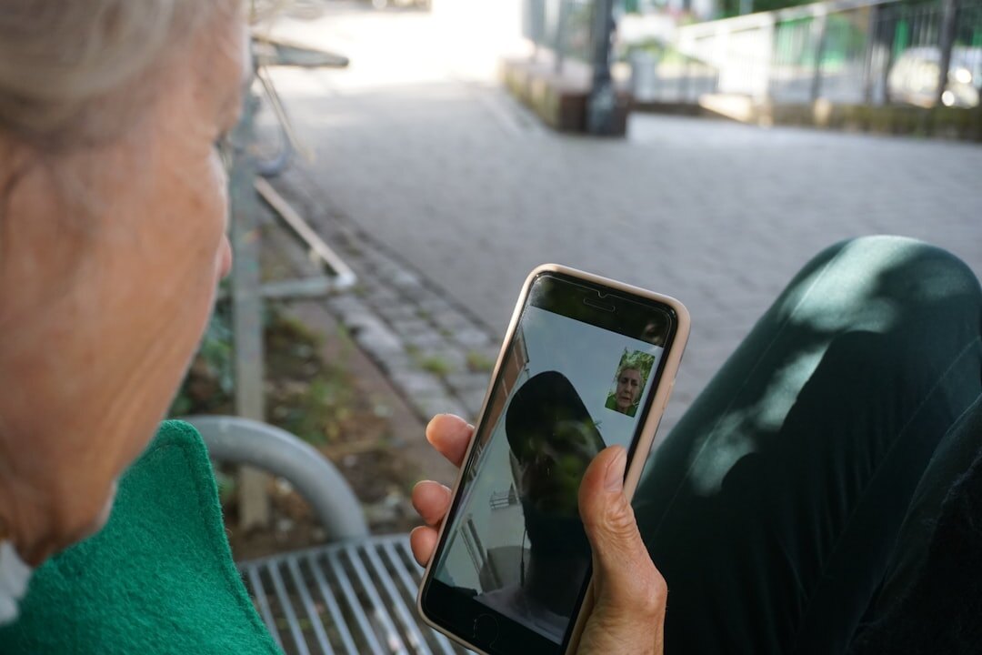 old woman showing photos